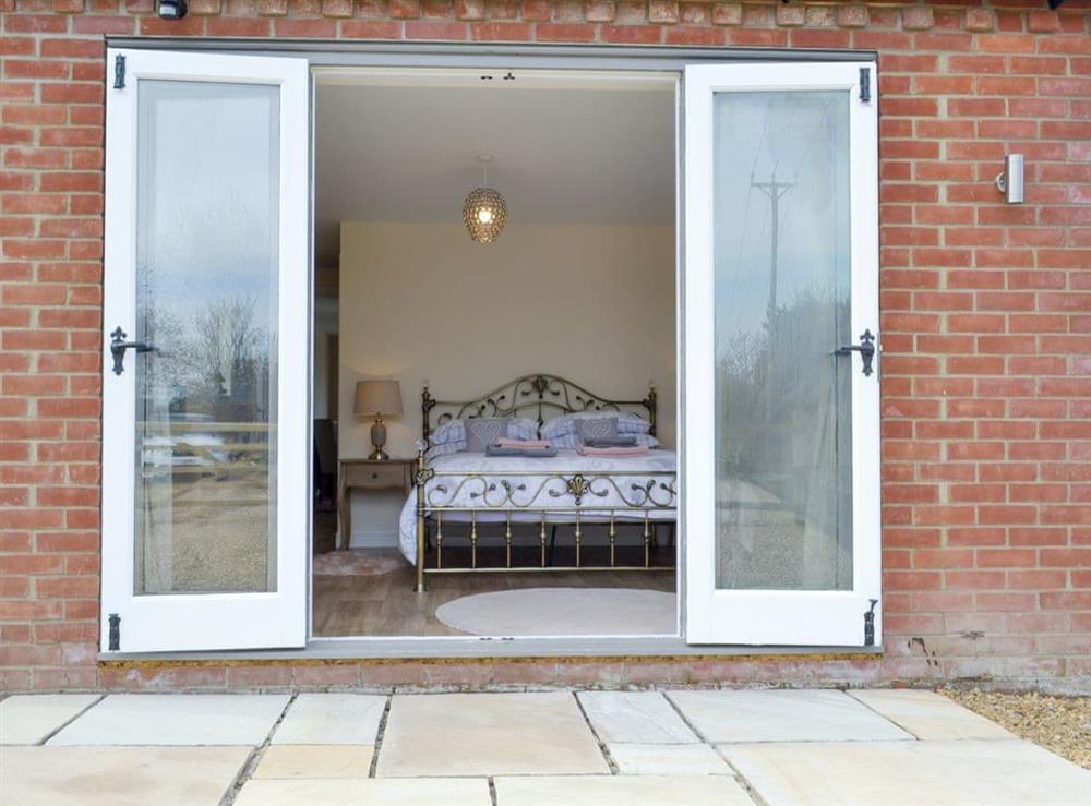Second patio area with access to the double bedroom at Hares Home in Thursford, near Fakenham, Norfolk