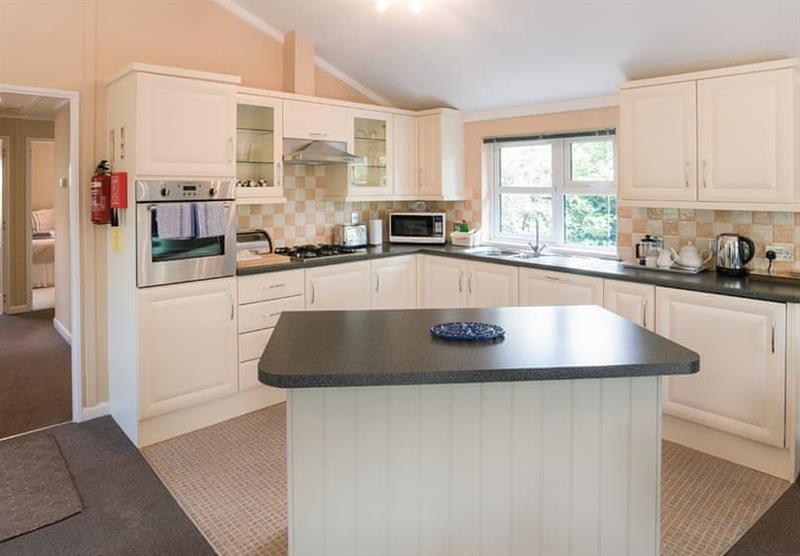 The kitchen area in a Cox Lodge at Harford Bridge in Tavistock, South Devon