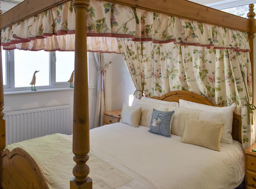Four Poster bedroom at Harlequin House in Holmfirth, West Yorkshire