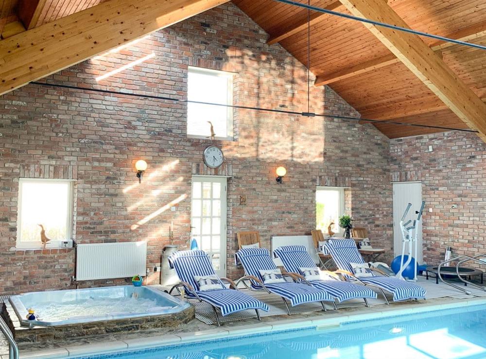 Swimming pool area can be booked at small extra cost (photo 2) at Harlequin House in Holmfirth, West Yorkshire