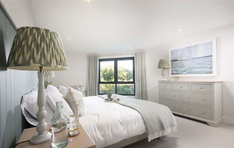 One of the bedrooms at Harlyn Penthouse, Cornwall