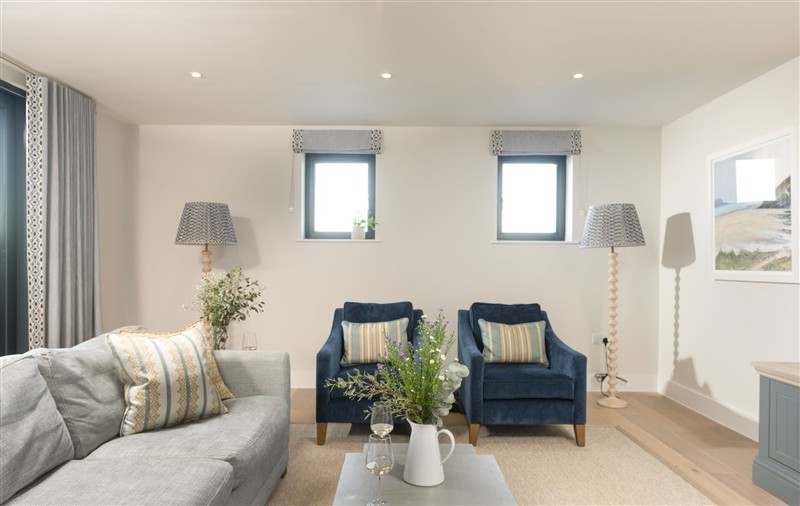 Relax in the living area (photo 2) at Harlyn Penthouse, Cornwall
