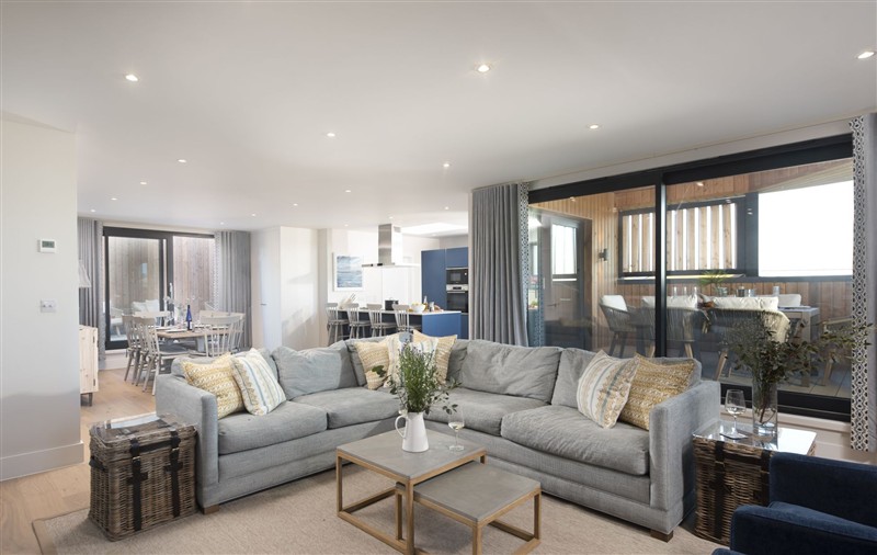Relax in the living area at Harlyn Penthouse, Cornwall
