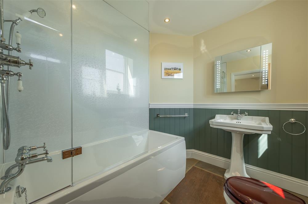 Ground floor: En-suite bathroom with overhead shower at Harome Chapel, Harome, near Helmsley 