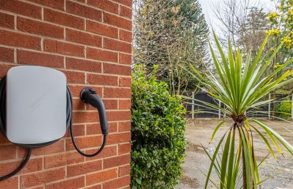 Electric car charging point in the front porch at Harp Garden, Fakenham