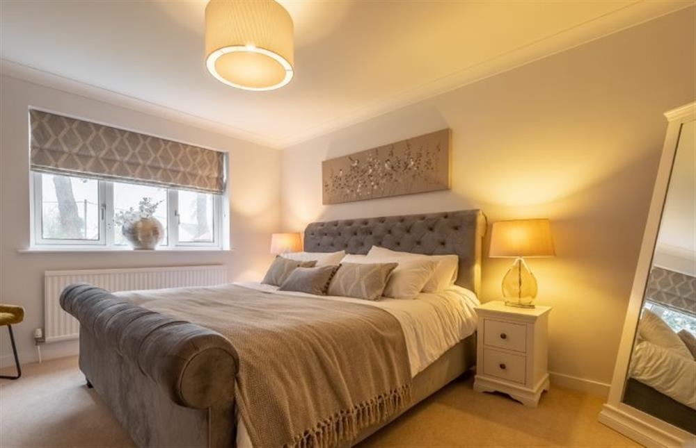 First floor: Bedroom two with 5ft king-size bed at Harp Garden, Fakenham