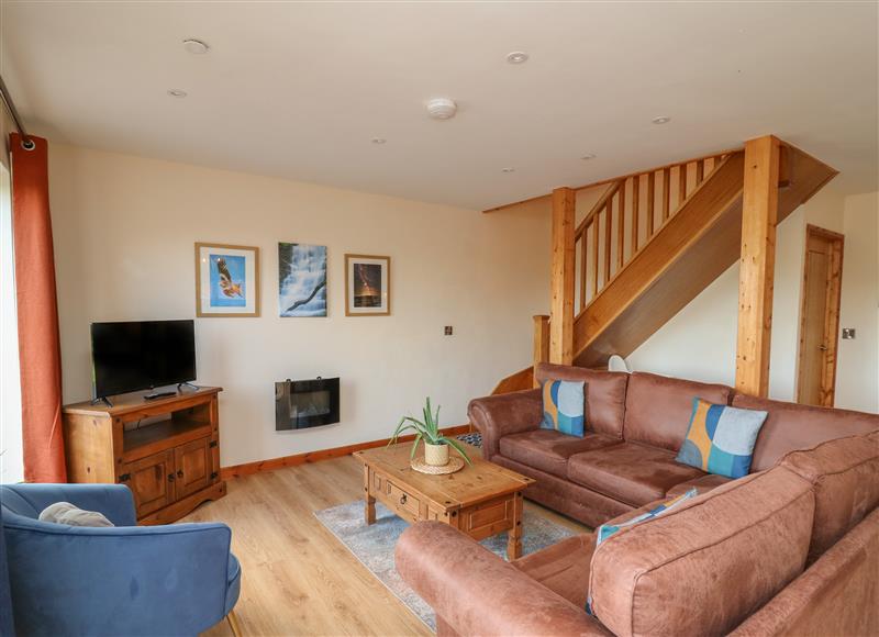 Relax in the living area at Harp Meadow, Presteigne