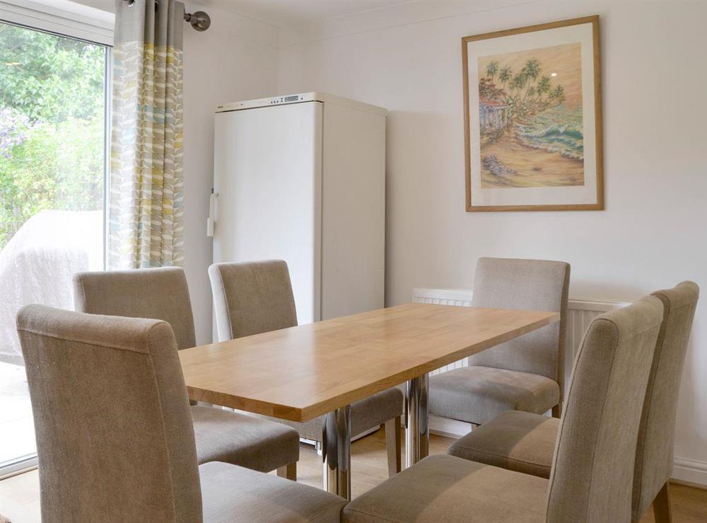 Light and airy dining room at Harrison Barber Cottage in Colnbrook, near Windsor, Berkshire