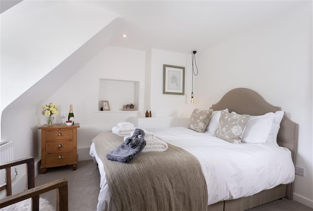 First floor: Bedroom with 5\u0027 king-size Hypnos bed at Harrowby End, Ebrington, near Chipping Campden