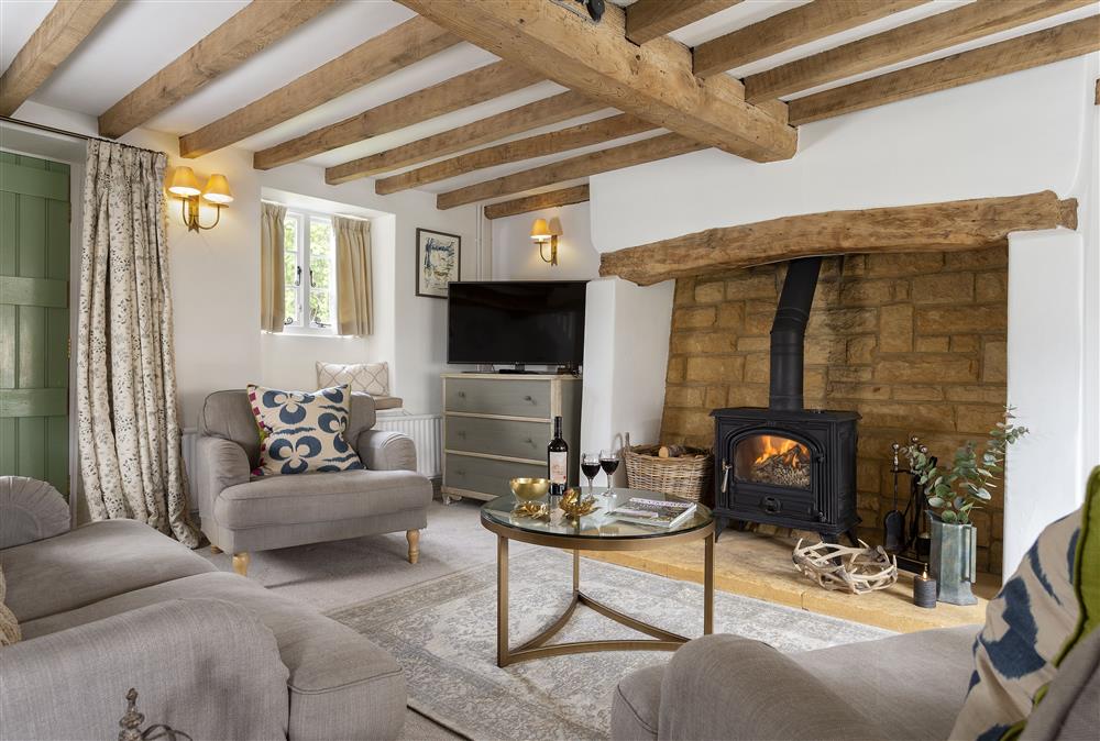 Ground floor: Large sitting room and dining area with inglenook fireplace  at Harrowby End, Ebrington, near Chipping Campden