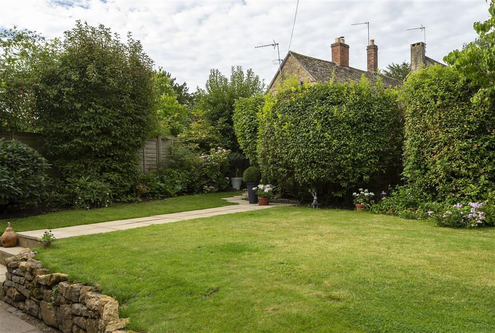 Pretty, enclosed rear garden with steep steps down to cottage at Harrowby End, Ebrington, near Chipping Campden