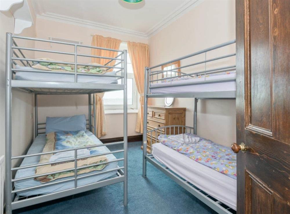 Convenient bedroom with 2 sets of bunk beds at Hartrees House in Silecroft, Cumbria