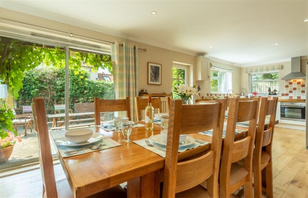 Ground floor: Dining area with french doors leading onto the garden at Harts House, Burnham Overy Staithe near Kings Lynn