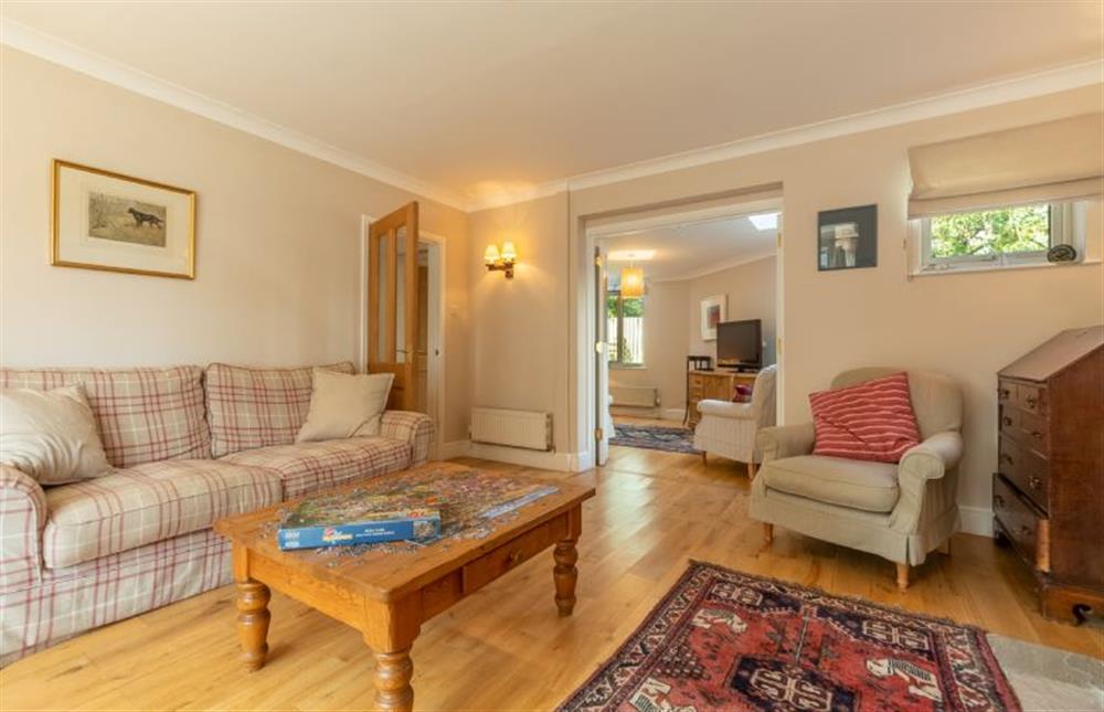 Ground floor: Sitting room with large comfortable seating at Harts House, Burnham Overy Staithe near Kings Lynn