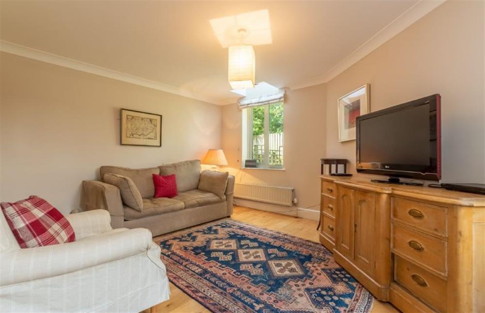 Ground floor: Snug with comfortable seating and television