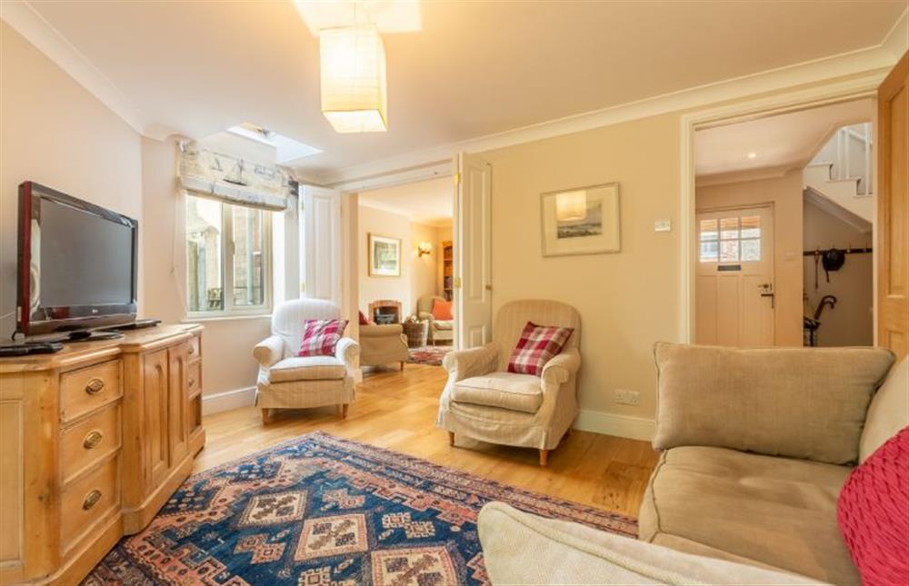 Ground floor: Snug with TV leads off from the living room at Harts House, Burnham Overy Staithe near Kings Lynn