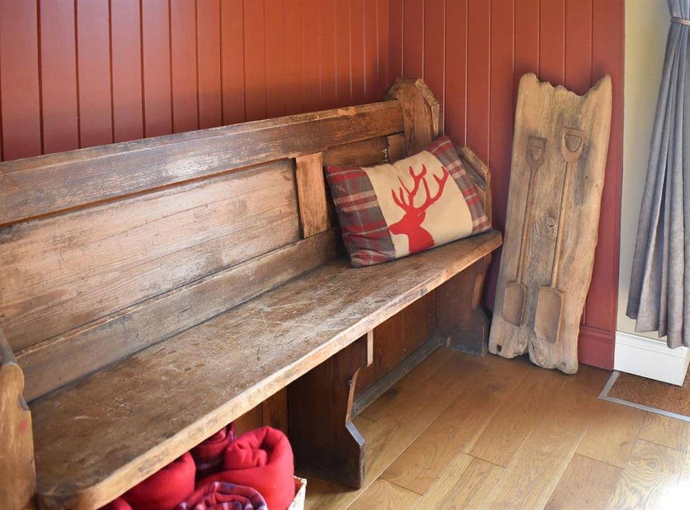 Rustic bench seating by  the back door
