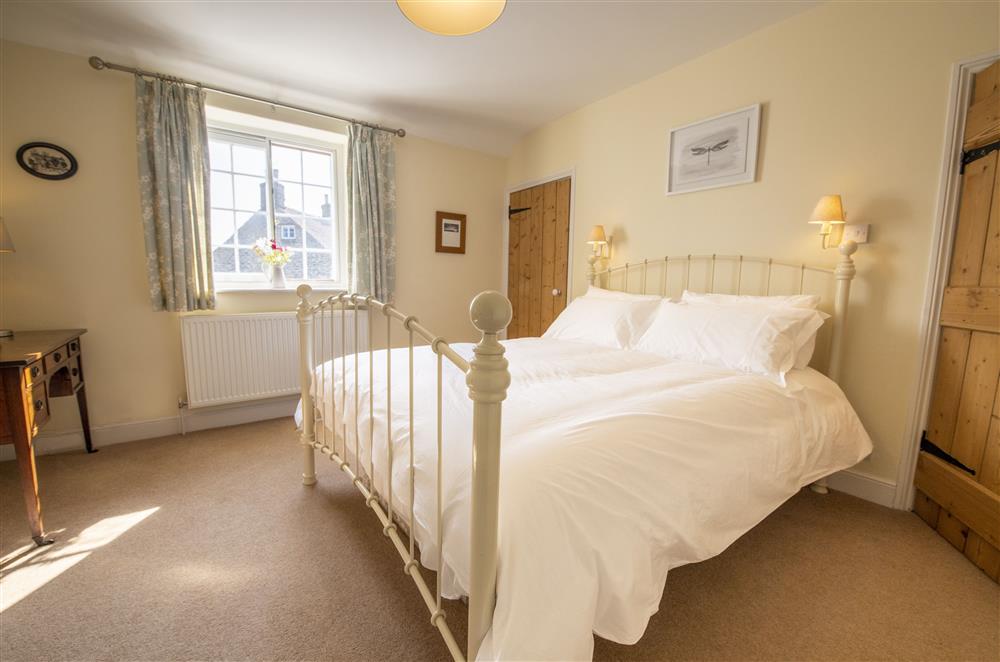 Bedroom with a king-size bed (photo 2) at Harwood Cottage, Hovingham