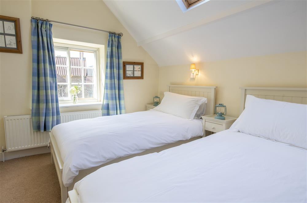 Bedroom with a twin single beds at Harwood Cottage, Hovingham