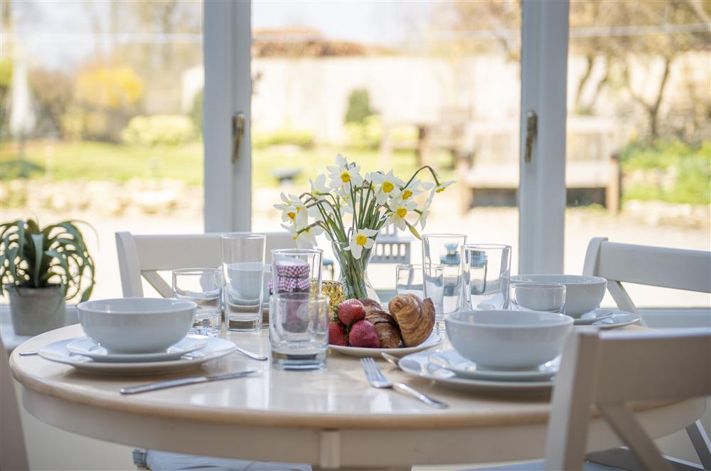 Enjoy breakfast from the conservatory at Harwood Cottage, Hovingham