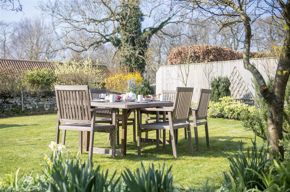 Garden furniture provided, along with a barbecue for alfresco dining at Harwood Cottage, Hovingham
