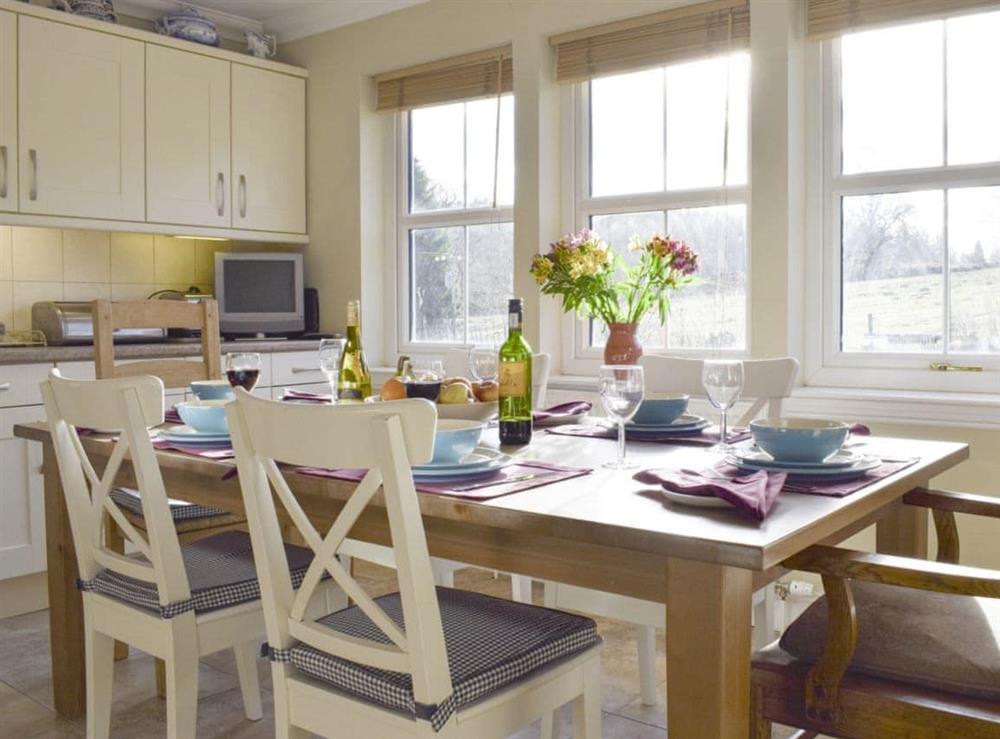 Convenient dining area within kitchen at Heather Croft, 