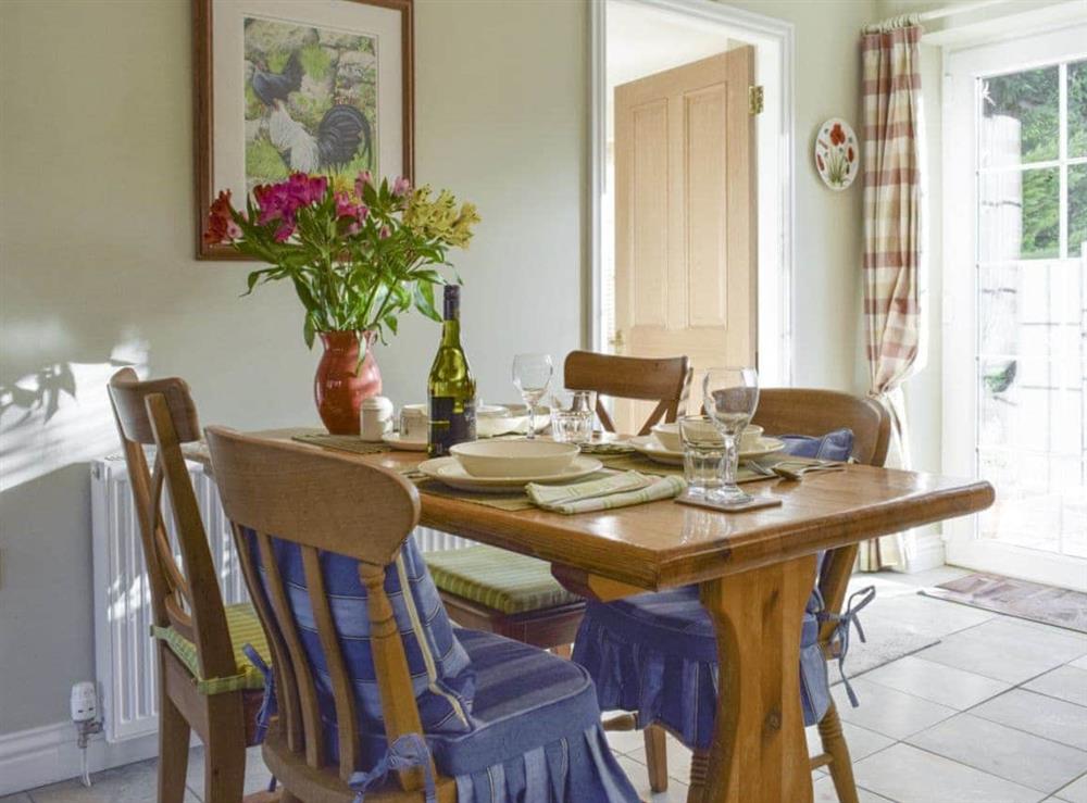 Convenient dining area within kitchen at The But ‘n Ben, 
