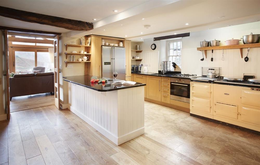 Open plan kitchen, dining area, sitting room and day room at Hause Hall Farm, Hallin Fell