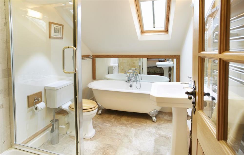 The Bannerdale en-suite bathroom with bath and separate shower at Hause Hall Farm, Hallin Fell