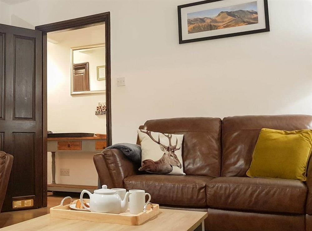 Comfortable seating within living room at Havelock Cottage in Windermere, Cumbria