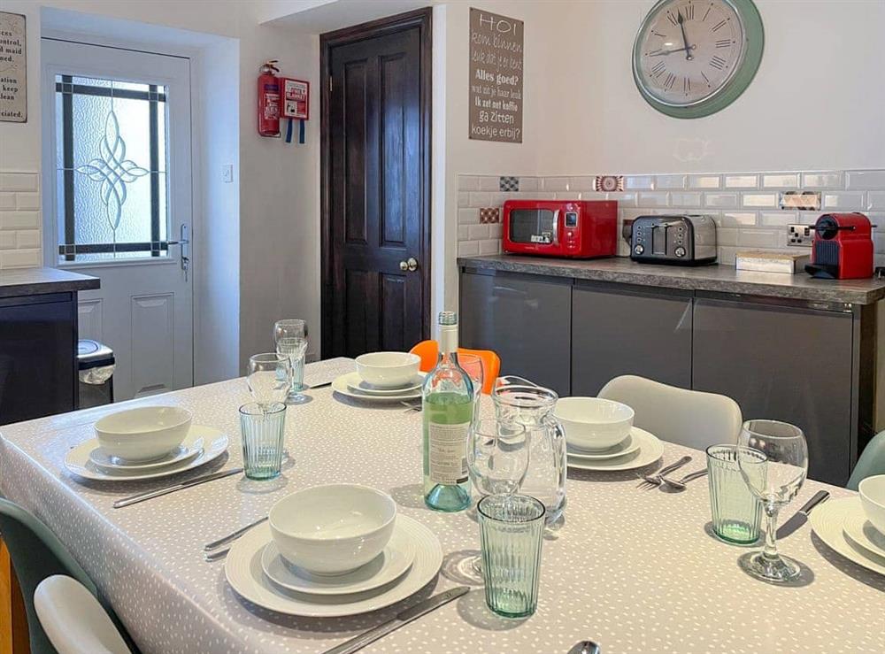 Comprehensively equipped kitchen and dining room at Havelock Cottage in Windermere, Cumbria