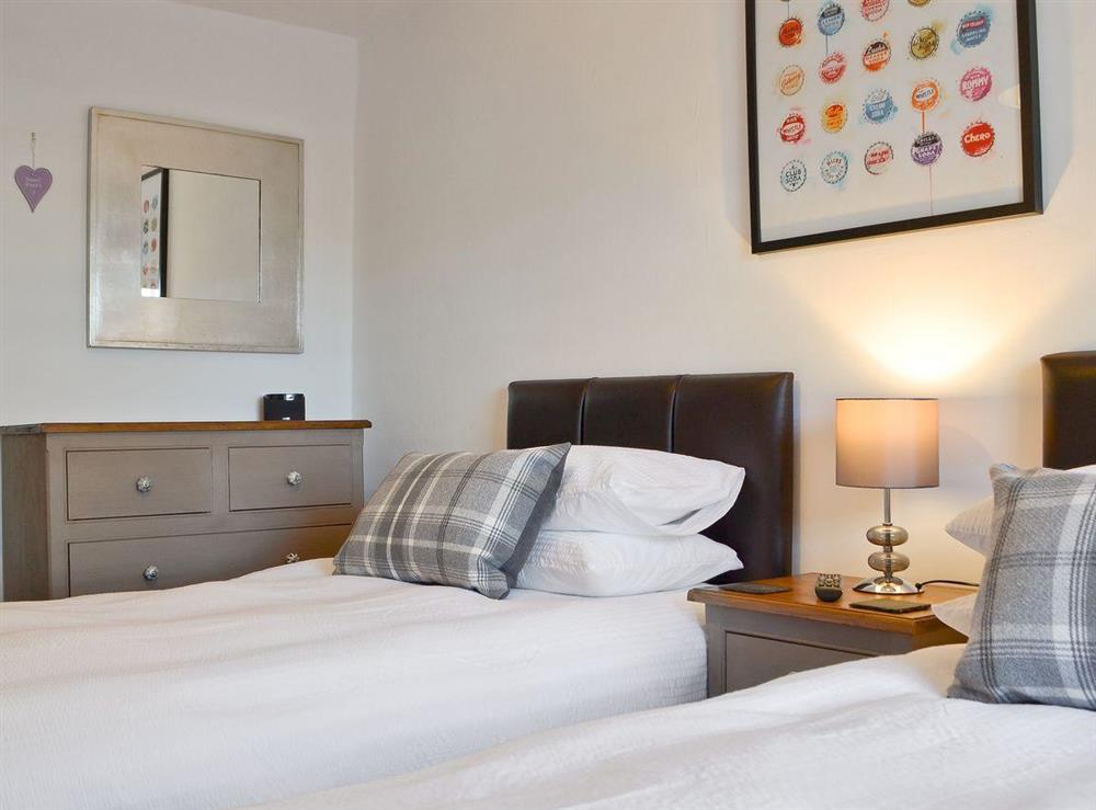 Well presented twin bedroom at Havelock Cottage in Windermere, Cumbria