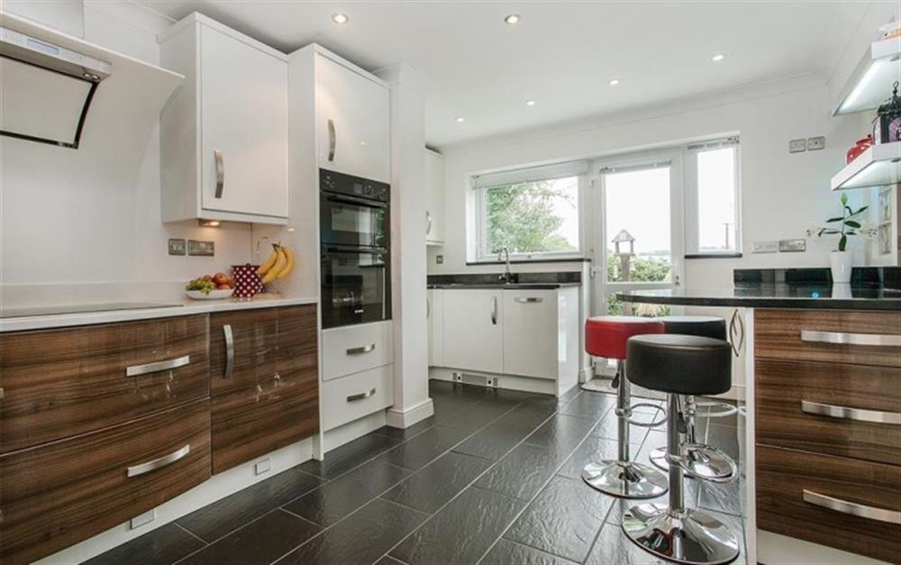 Impressive sized modern kitchen with breakfast bar  at Haven Retreat in Seaton