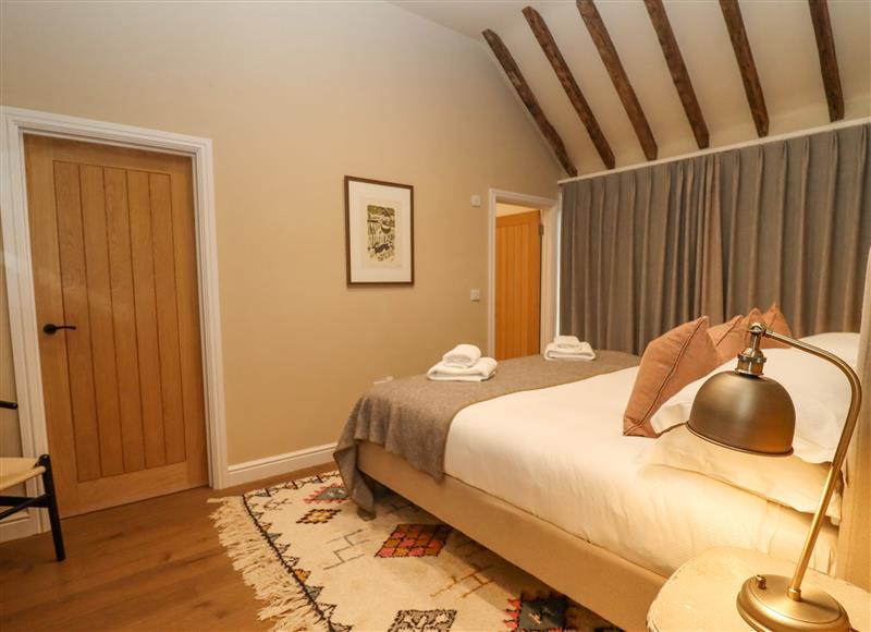One of the bedrooms at Hawthorn Barn, Northleach