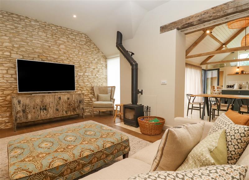 Relax in the living area at Hawthorn Barn, Northleach