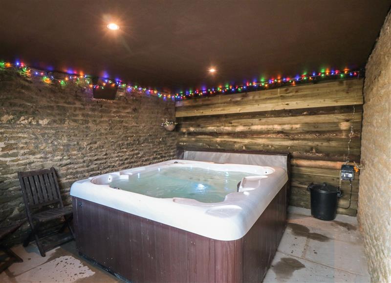 Relax in the hot tub at Hawthorn Cottage, Silpho near Scalby