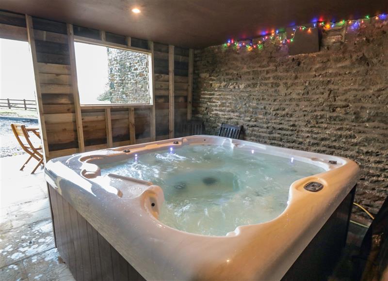 There is a hot tub at Hawthorn Cottage, Silpho near Scalby