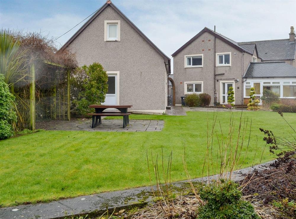 Holiday home with lawned garden at Hawthorn Cottage in Stranraer, Wigtownshire