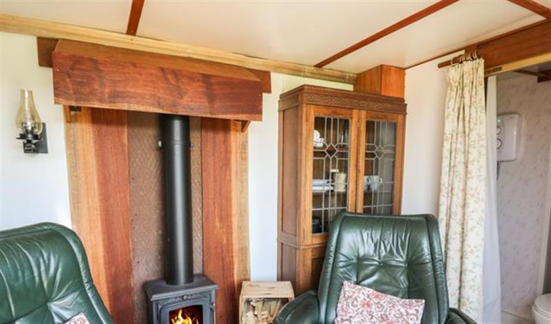 Relax in the living area (photo 2) at Hawthorn Hut, Llangurig