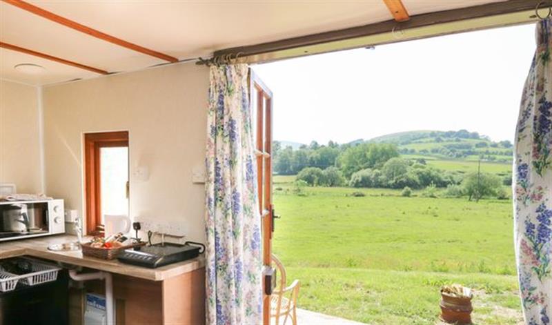 Relax in the living area at Hawthorn Hut, Llangurig