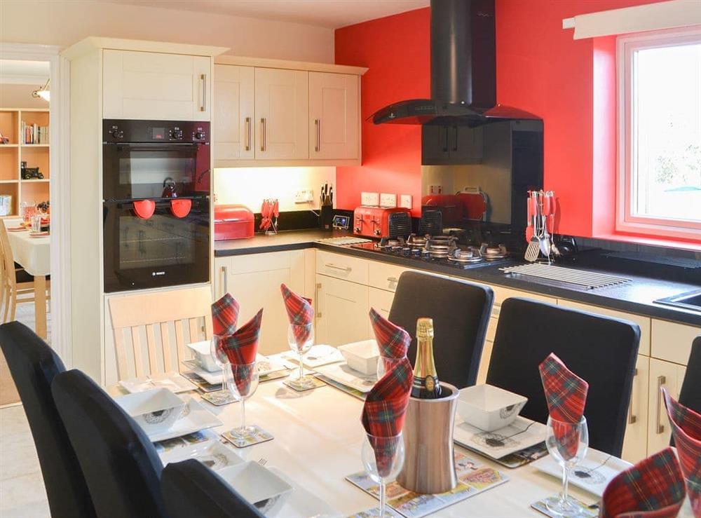 Large kitchen/diner with access to the utility room at Hawthorne House in Amble, near Warkworth, Northumberland