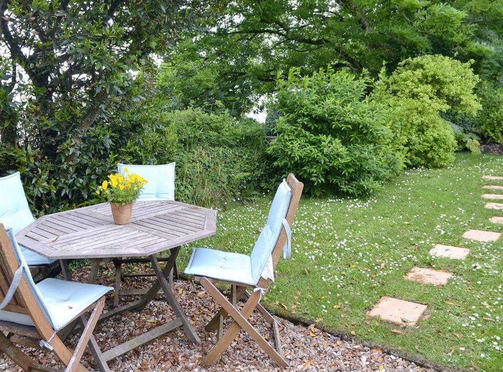 Sitting out area with lawned front garden at Hay Cottage in St Austell, S. Cornwall., Great Britain