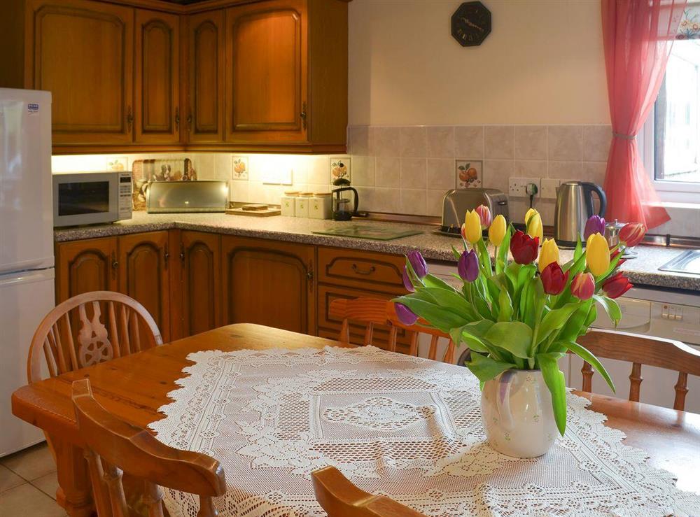 Delightful fitted kitchen at Haycombe Cottage in Camelford, Cornwall