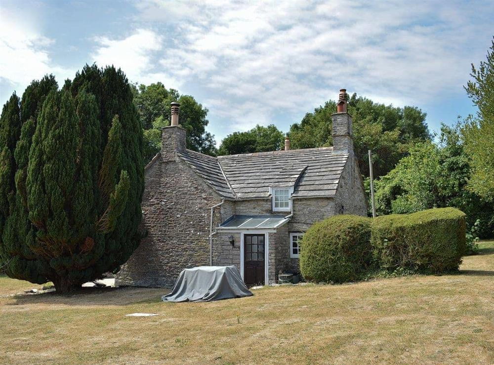 Set in a large lawned garden at Haycraft Cottage in Harmans Cross, near Swanage, Dorset