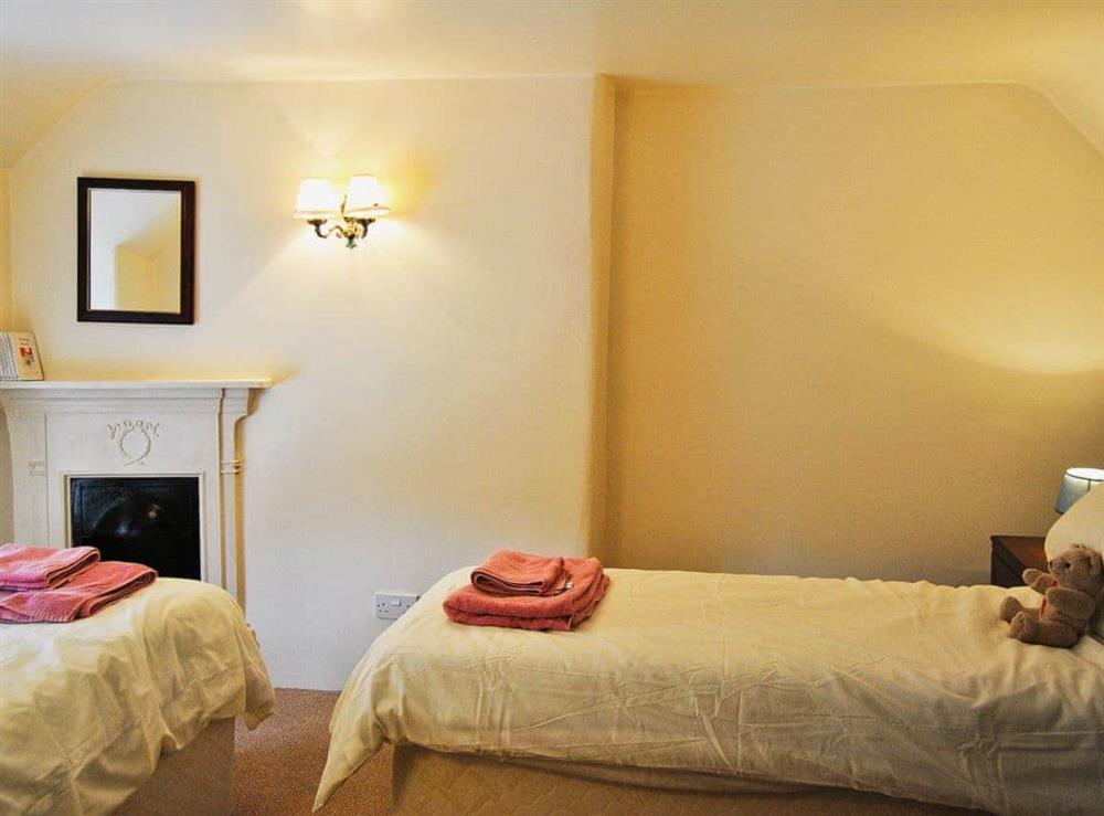 Twin bedroom at Haycraft Cottage in Harmans Cross, near Swanage, Dorset