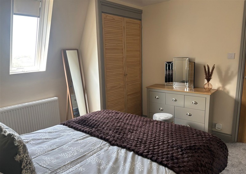 One of the bedrooms at Hayes Lodge Coach House, Ashreigney near Dolton