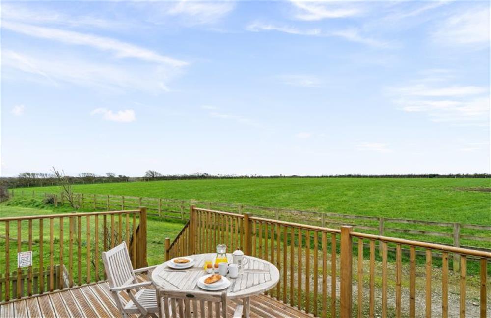 Enjoy the far reaching countryside views from the balcony  at Hayloft at Trevissick Farm, Porthtowan