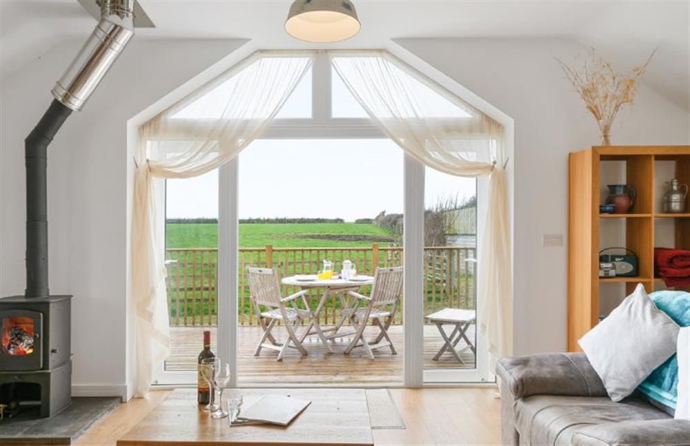 The balcony is the perfect area to enjoy a morning coffee or an evening tipple  at Hayloft at Trevissick Farm, Porthtowan