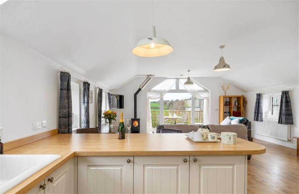 The bright and airy open-plan kitchen and sitting room  at Hayloft at Trevissick Farm, Porthtowan