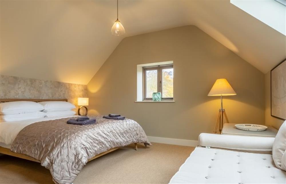Master bedroom with 6’ super king bed at Hayloft, Burnham Market near Kings Lynn